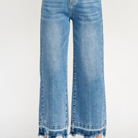 Tummy Control High Rise Crop Wide W/ Released Hem in a relaxed style with wide-leg silhouette and frayed hem.