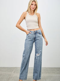 Model wearing Mid Rise Relaxed Straight With Destroy jeans, showcasing a relaxed fit and destroyed detailing.