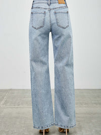 Mid Rise Relaxed Straight With Destroy back view of jeans with destroyed detailing and a relaxed fit.