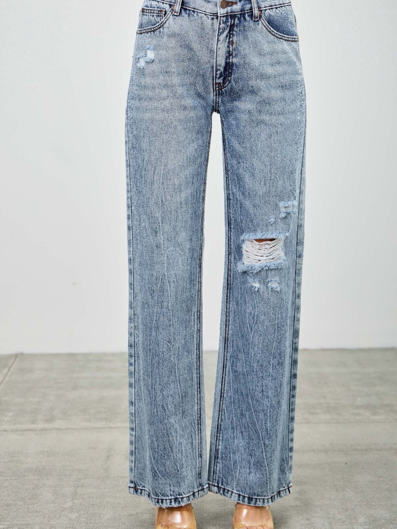 Mid Rise Relaxed Straight With Destroy jeans featuring a light wash and distressed detailing, perfect for casual wear.