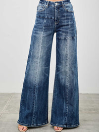 Mid Rise Wid Leg wide leg jeans in soft, stretch-infused denim blend with a modern silhouette, perfect for versatile outfits.