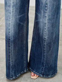 Mid Rise Wid Leg jeans showcasing a wide leg silhouette and soft, stretch-infused denim for comfortable, stylish wear.
