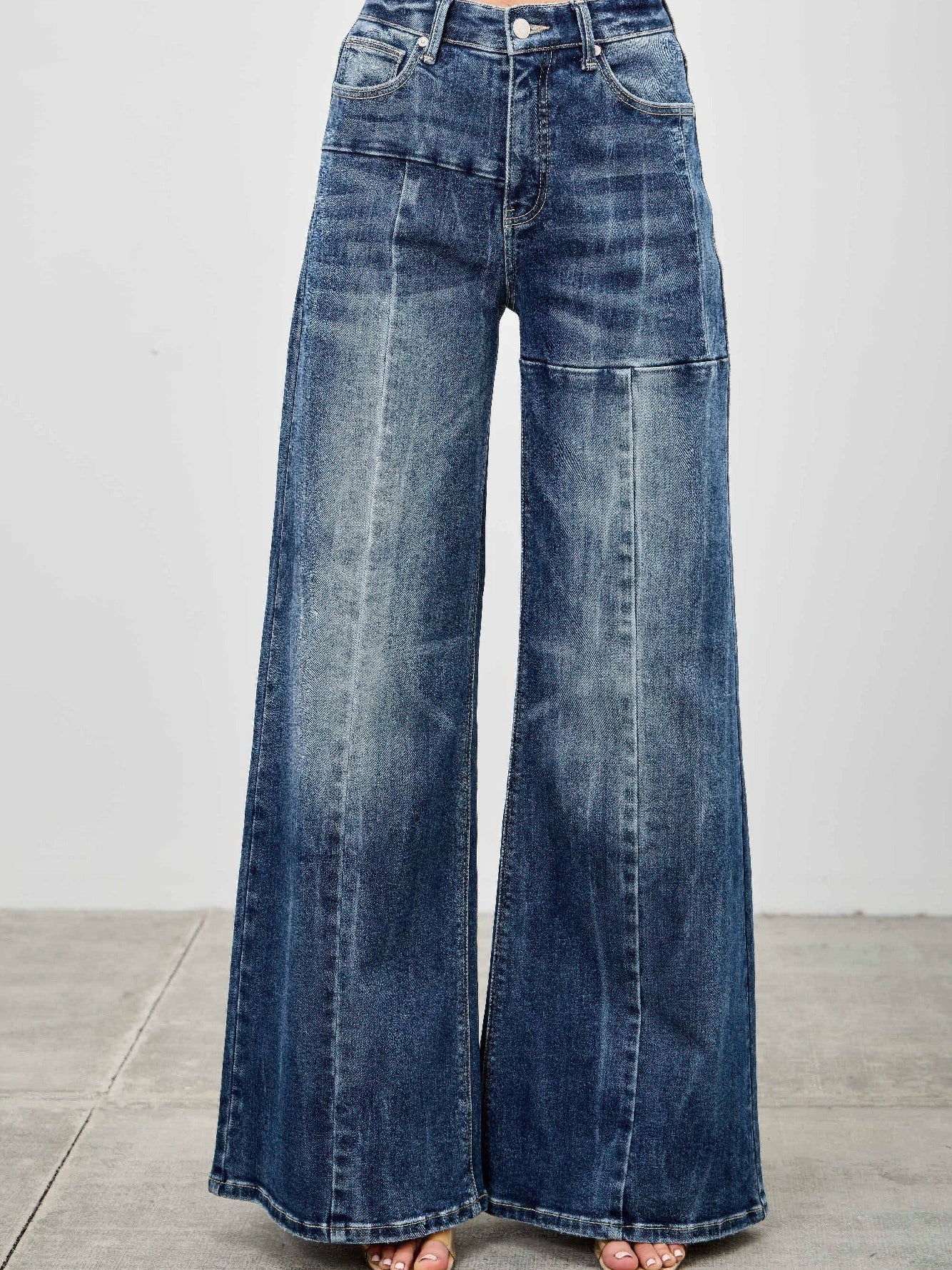 Mid Rise Wid Leg jeans displayed on model, showcasing modern wide leg silhouette and soft denim blend.