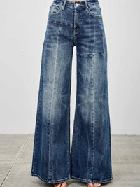 Mid Rise Wid Leg jeans displayed on model, showcasing modern wide leg silhouette and soft denim blend.