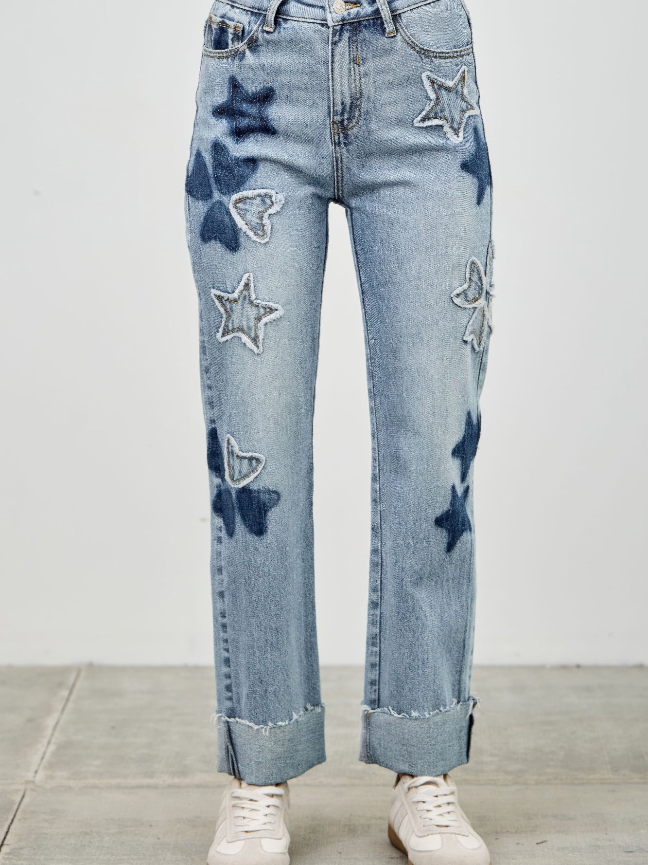 High Rise Star & Heart Patched Dad Jean W/stretch featuring star and heart patches with a relaxed fit.