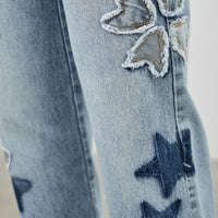 High Rise Star & Heart Patched Dad Jean W/stretch featuring heart and star patchwork on denim fabric
