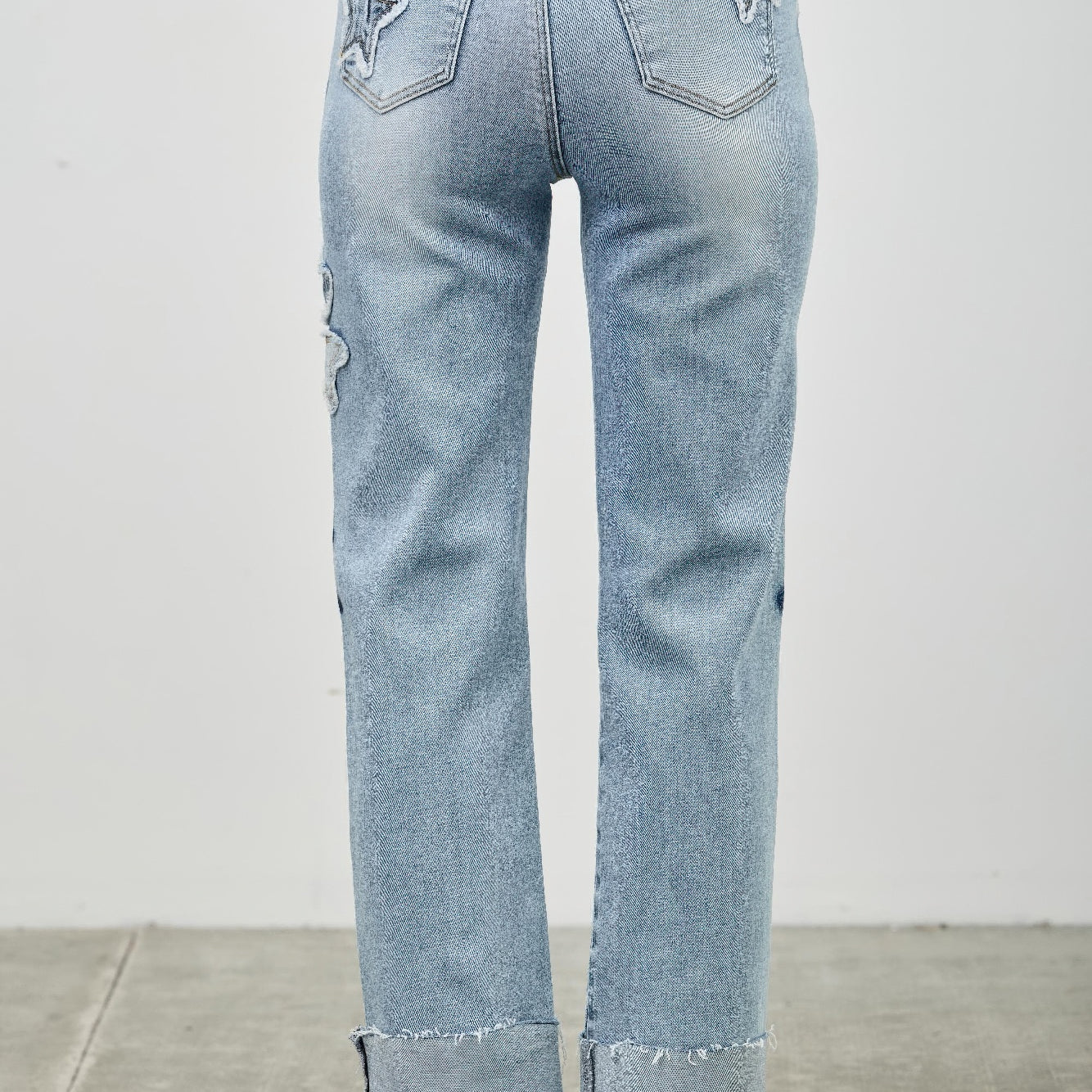 High Rise Star & Heart Patched Dad Jean W/stretch shown from the back, featuring playful star patches and a relaxed fit.