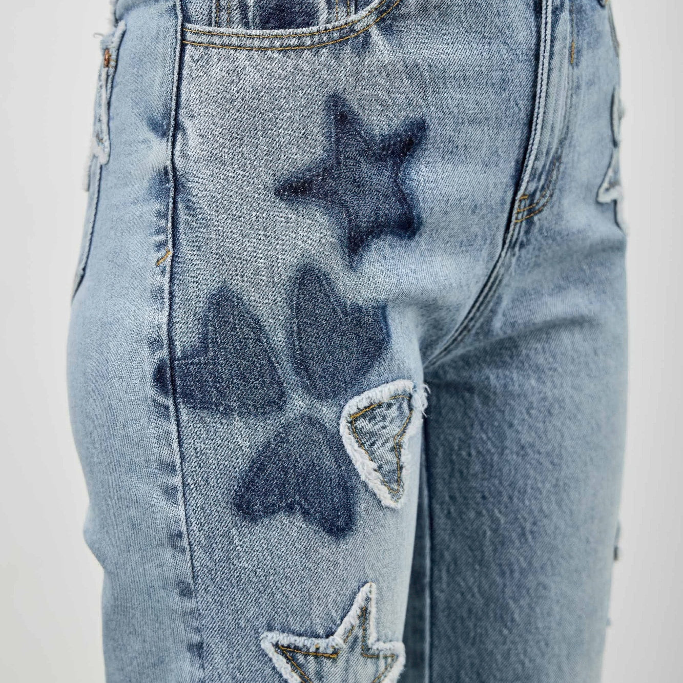 High Rise Star & Heart Patched Dad Jean W/stretch featuring playful star patches on denim.