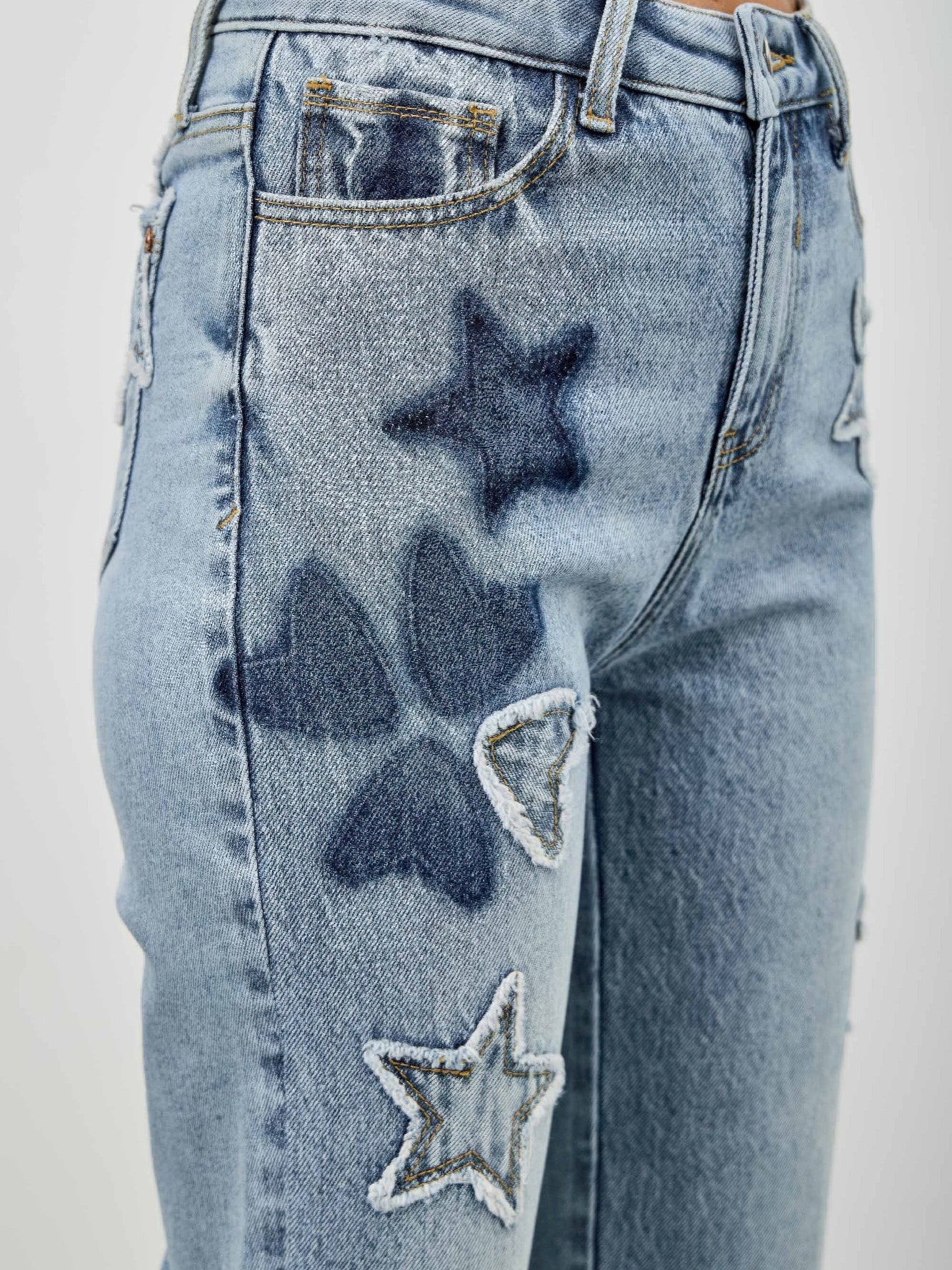 High Rise Star & Heart Patched Dad Jean W/stretch featuring playful star patches on denim.
