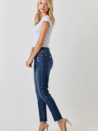 High Rise Ankle Skinny With Button Fly showcased on a model, featuring a stylish fit and exposed button fly.