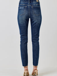 High Rise Ankle Skinny With Button Fly - Back view showing the sleek, form-fitting design and vintage-inspired details.