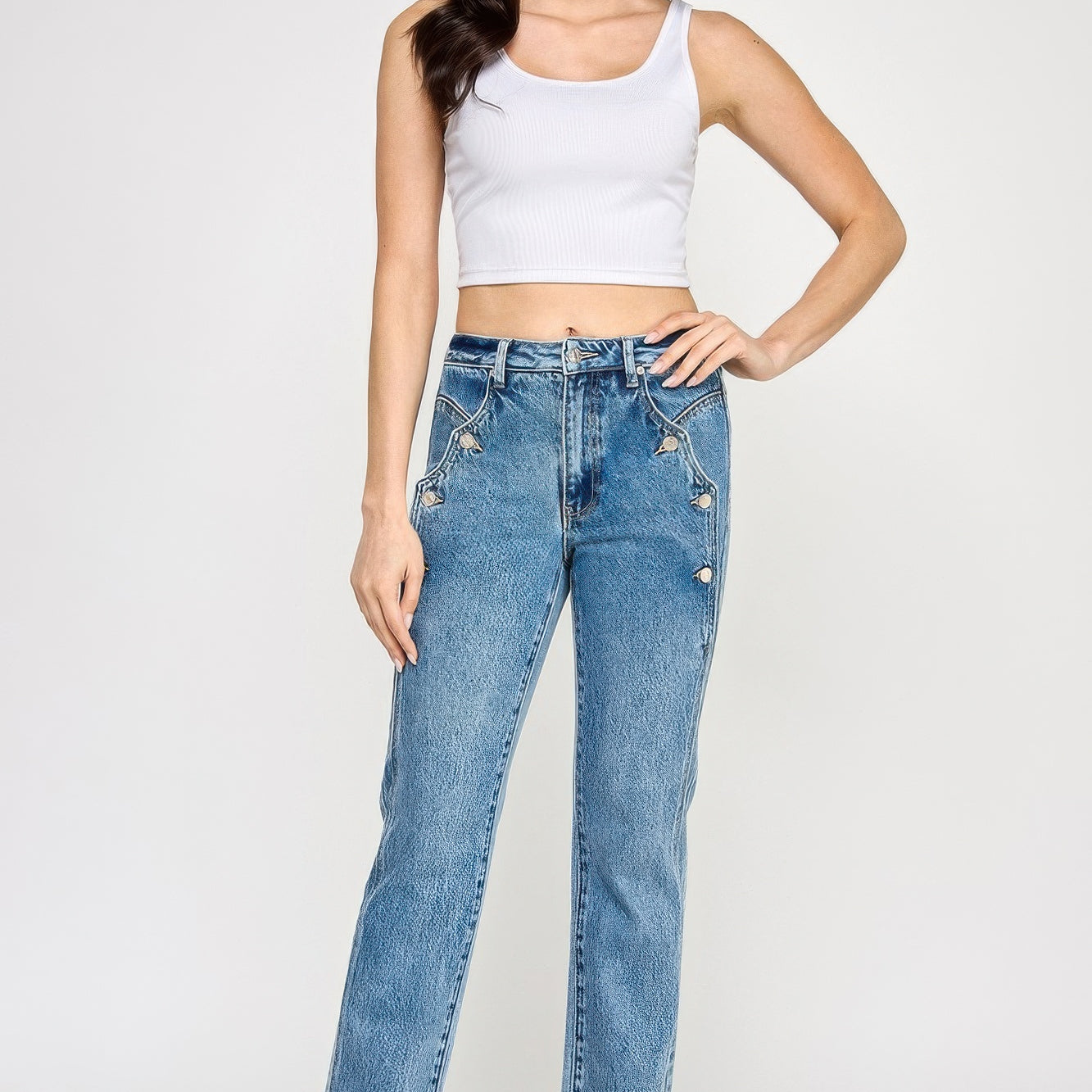 Model wearing High Rise Dad Jean With Scallop Pocket paired with a white crop top.