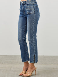 Mid Rise Skinny Crop Tummy Control jeans featuring a flattering fit and stylish cropped length.
