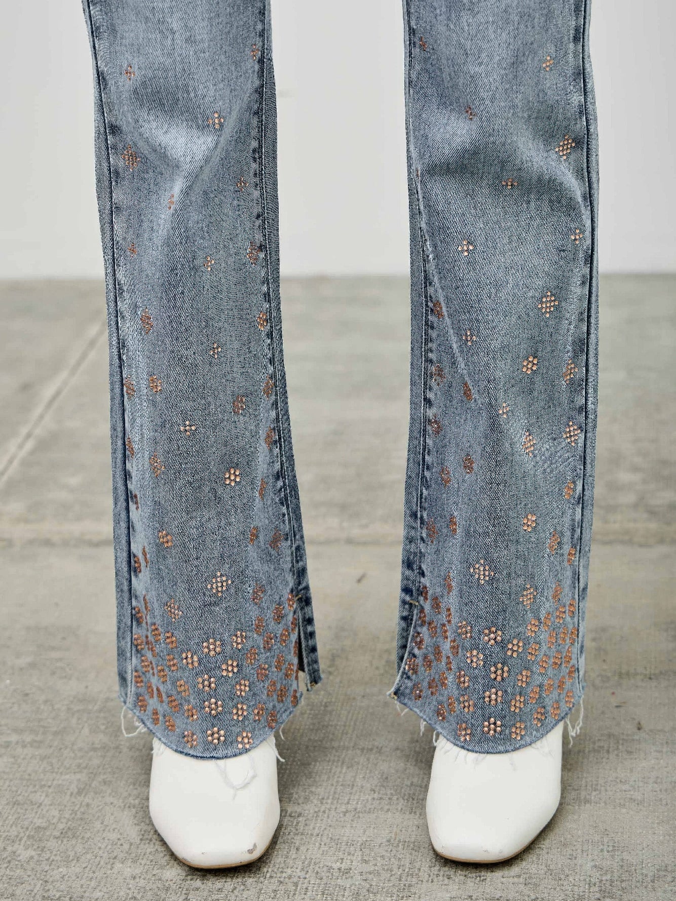 High Rise Kick Flare With Rhinestone adorned denim jeans, featuring subtle rhinestone embellishments and a modern fit.