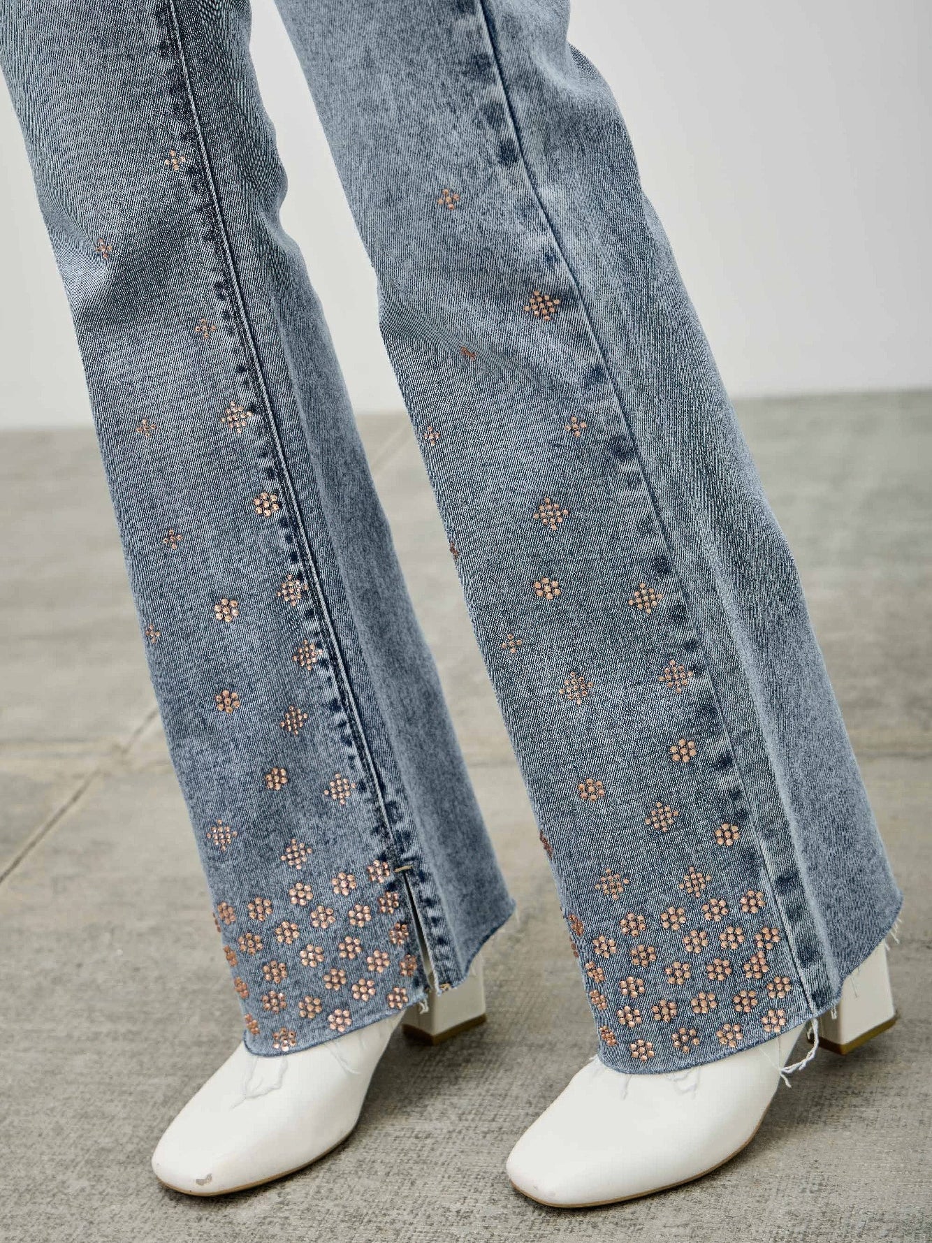 High Rise Kick Flare With Rhinestone showcasing rhinestone embellishments on flared denim jeans.