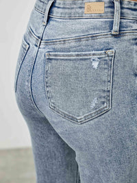 High Rise Kick Flare With Rhinestone back view showing subtle distressing and flattering fit.