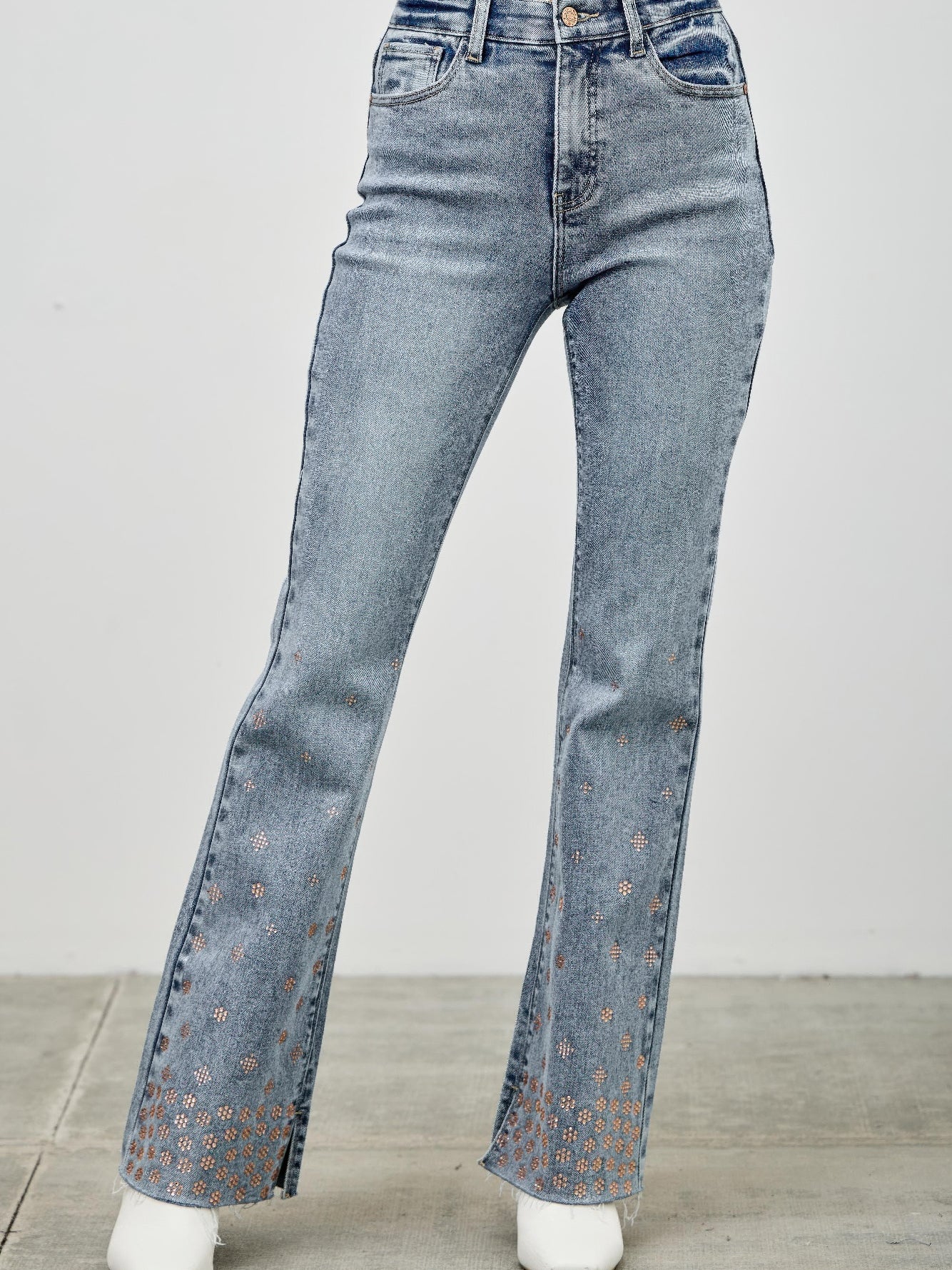 High Rise Kick Flare With Rhinestone featuring rhinestone embellishments on the hem, stylish high-rise denim jeans.