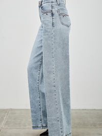 High Rise Wide Leg jeans in light wash with a relaxed fit and five-pocket styling.