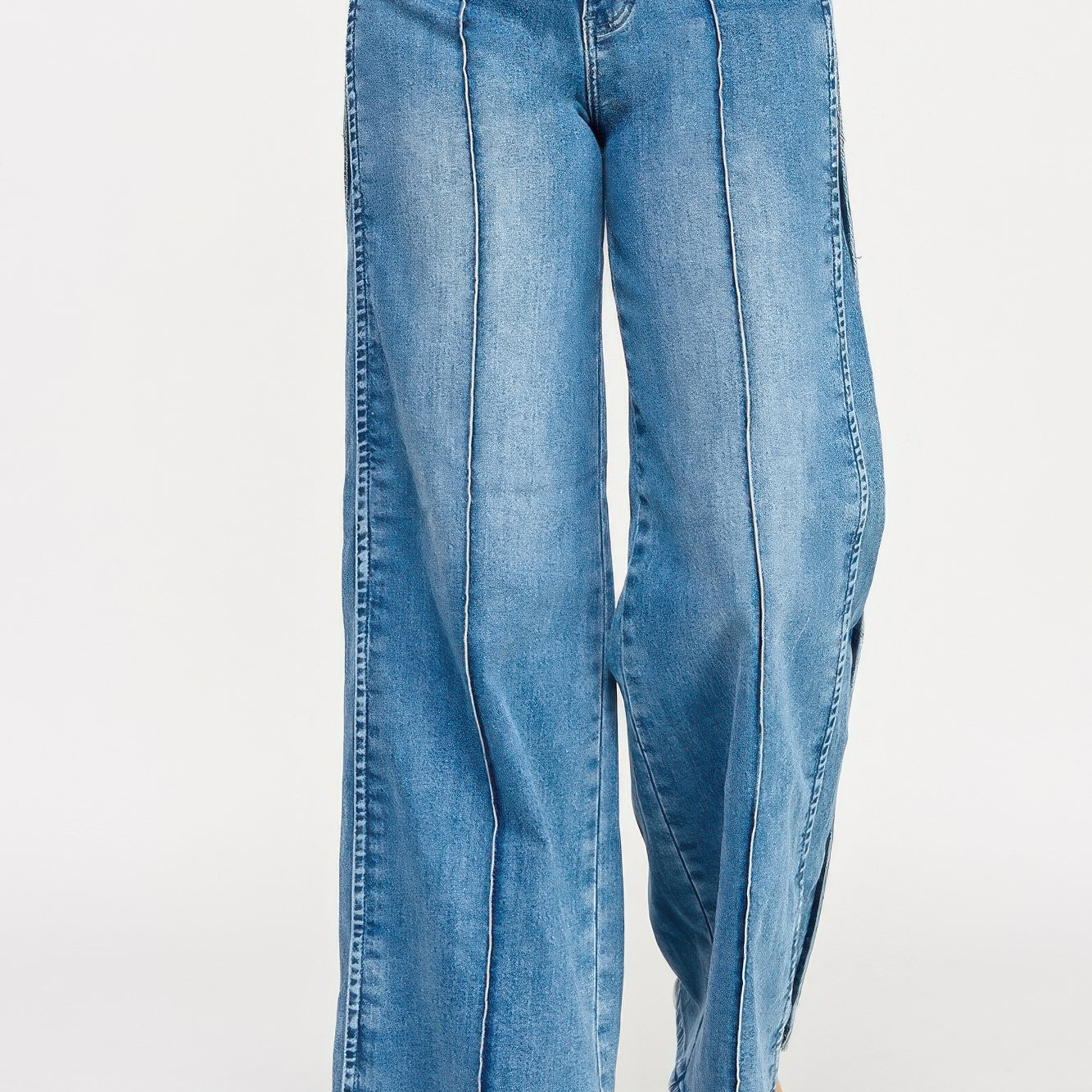 High Rise Wide Leg With Tummy Control jeans in light blue with wide leg silhouette and supportive waistband.