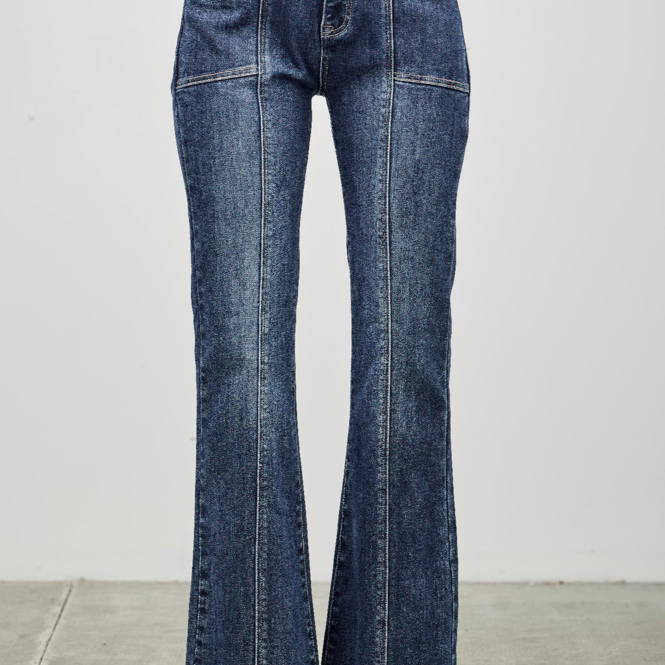 High Rise Boot Cut With Seam Detail jeans featuring a flattering high-rise fit and stylish seam detailing.