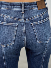 High Rise Boot Cut With Seam Detail showing back view of jeans with seam detailing and pockets.