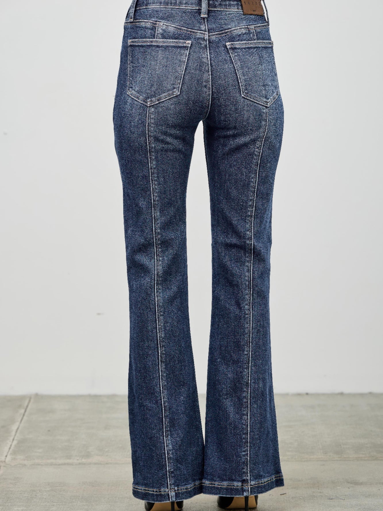 High Rise Boot Cut With Seam Detail shown from the back, featuring a flattering fit and a classic boot cut flare.