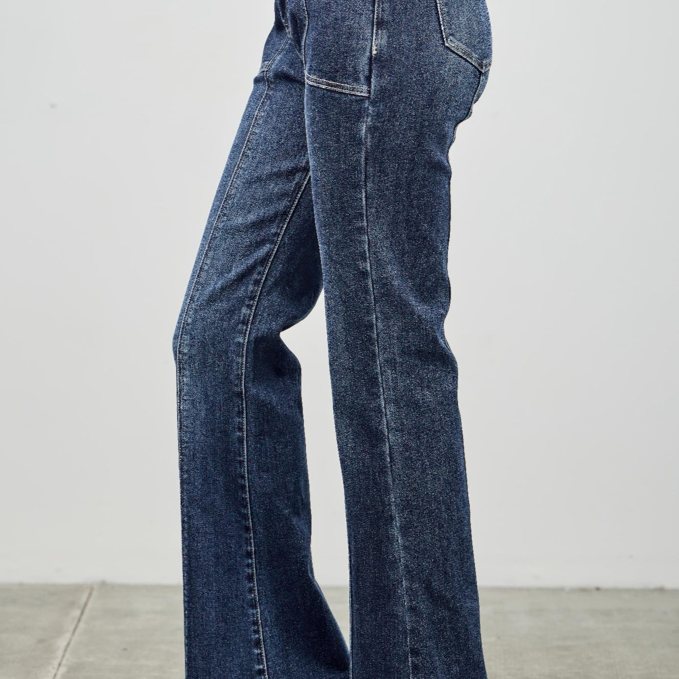 High Rise Boot Cut With Seam Detail feature a modern silhouette in soft, stretchy denim, perfect for a flattering fit.