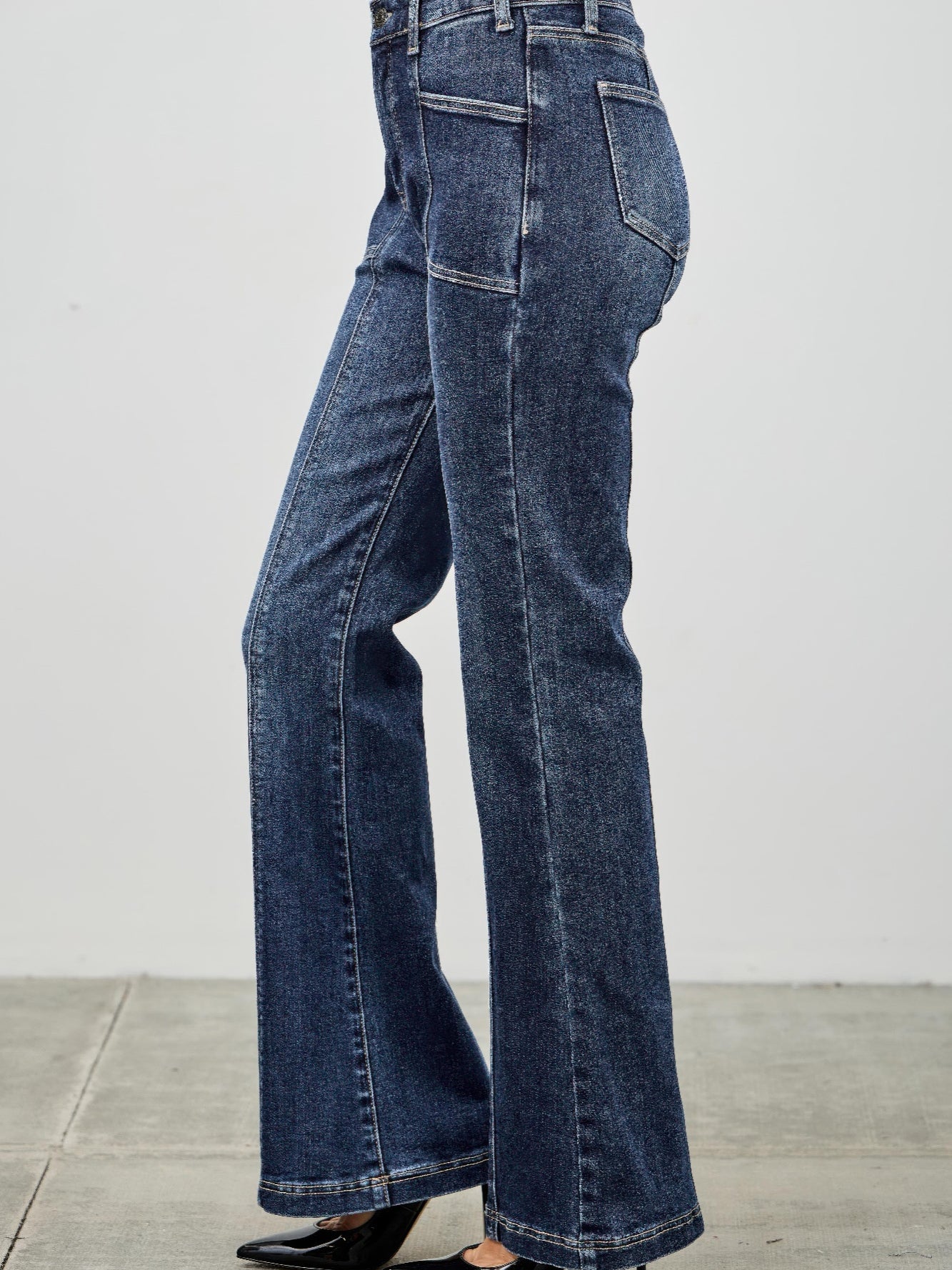 High Rise Boot Cut With Seam Detail feature a modern silhouette in soft, stretchy denim, perfect for a flattering fit.