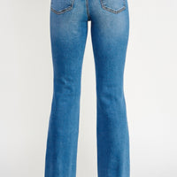 Back view of Tummy Control Mid Rise Skinny Bootcut jeans showcasing the flattering bootcut silhouette.