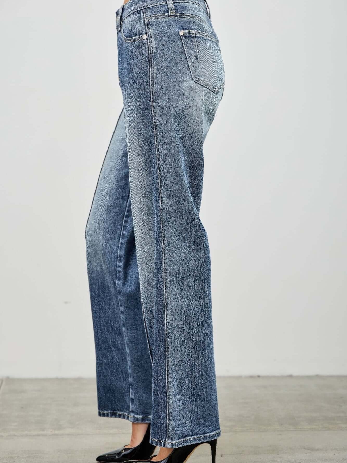 Mid Rise Straight With Pintuck jeans in a side view showcasing denim texture and tailored fit.