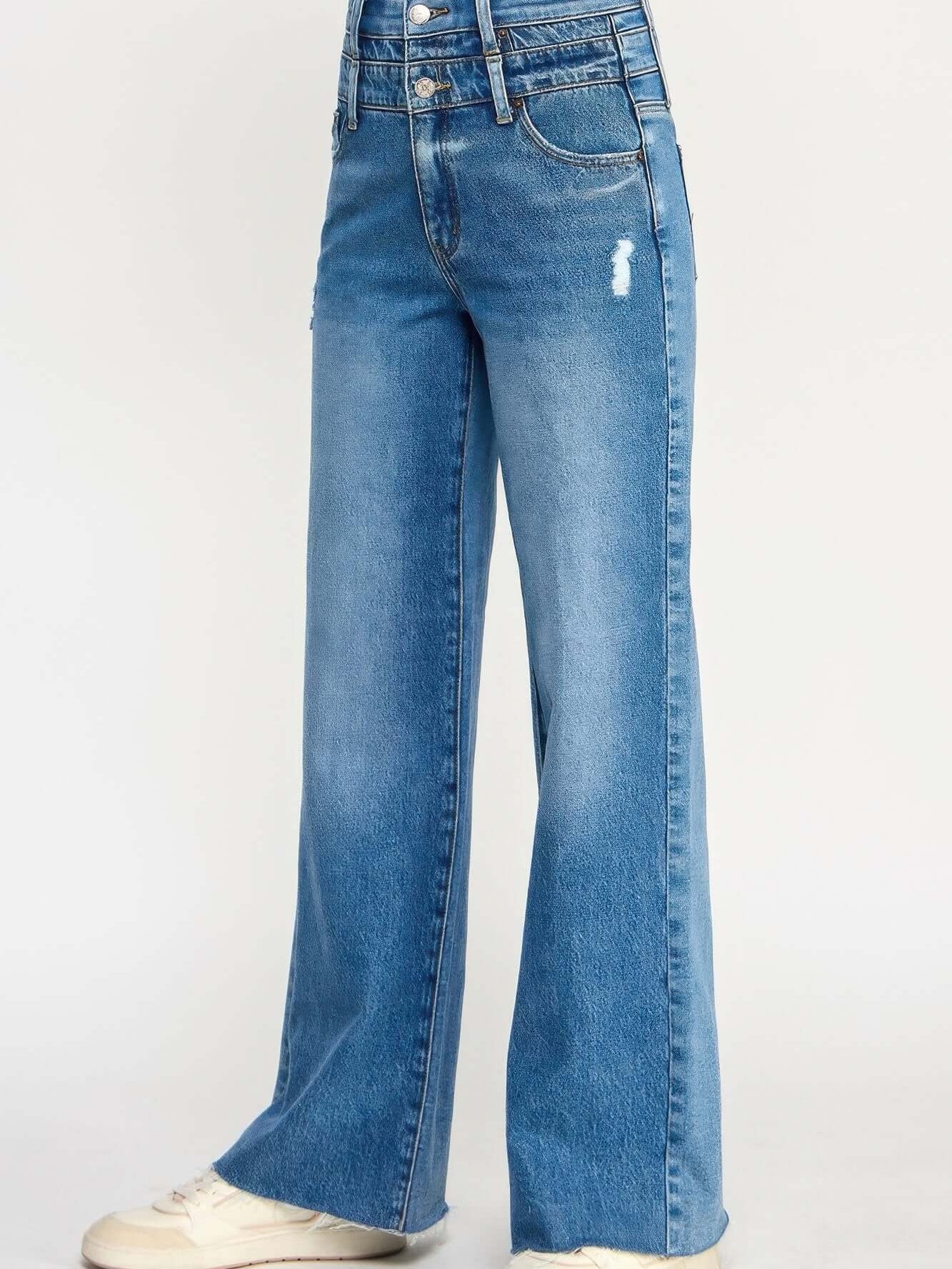 High Rise Double Waist Wide Leg jeans in light wash with a wide leg cut and distressed details.