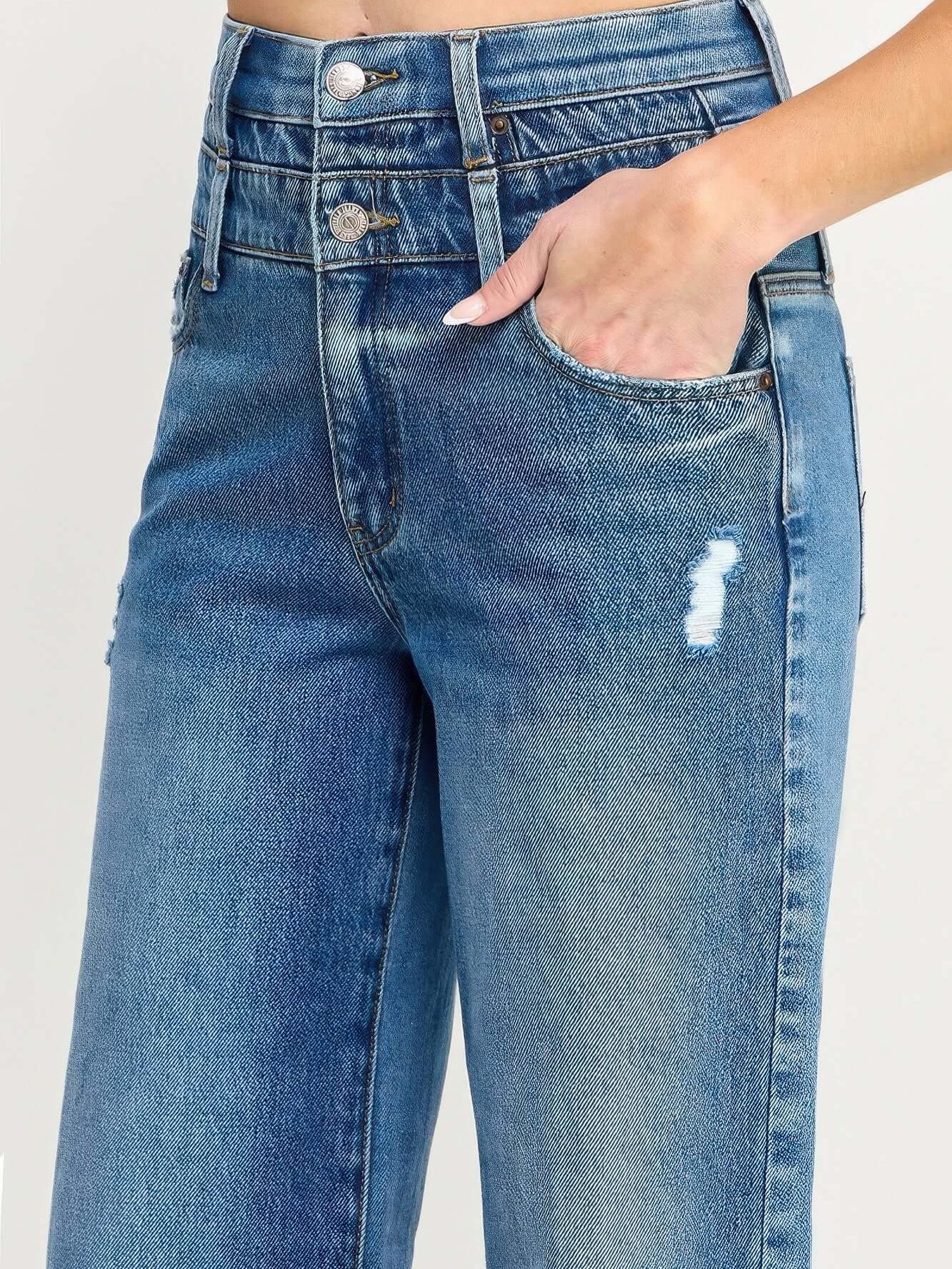 Close-up of High Rise Double Waist Wide Leg jeans showcasing double waistband and stylish distressing details.