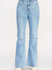 High Rise Flare With Seam Detail jeans featuring elongating seams and a stylish flare.