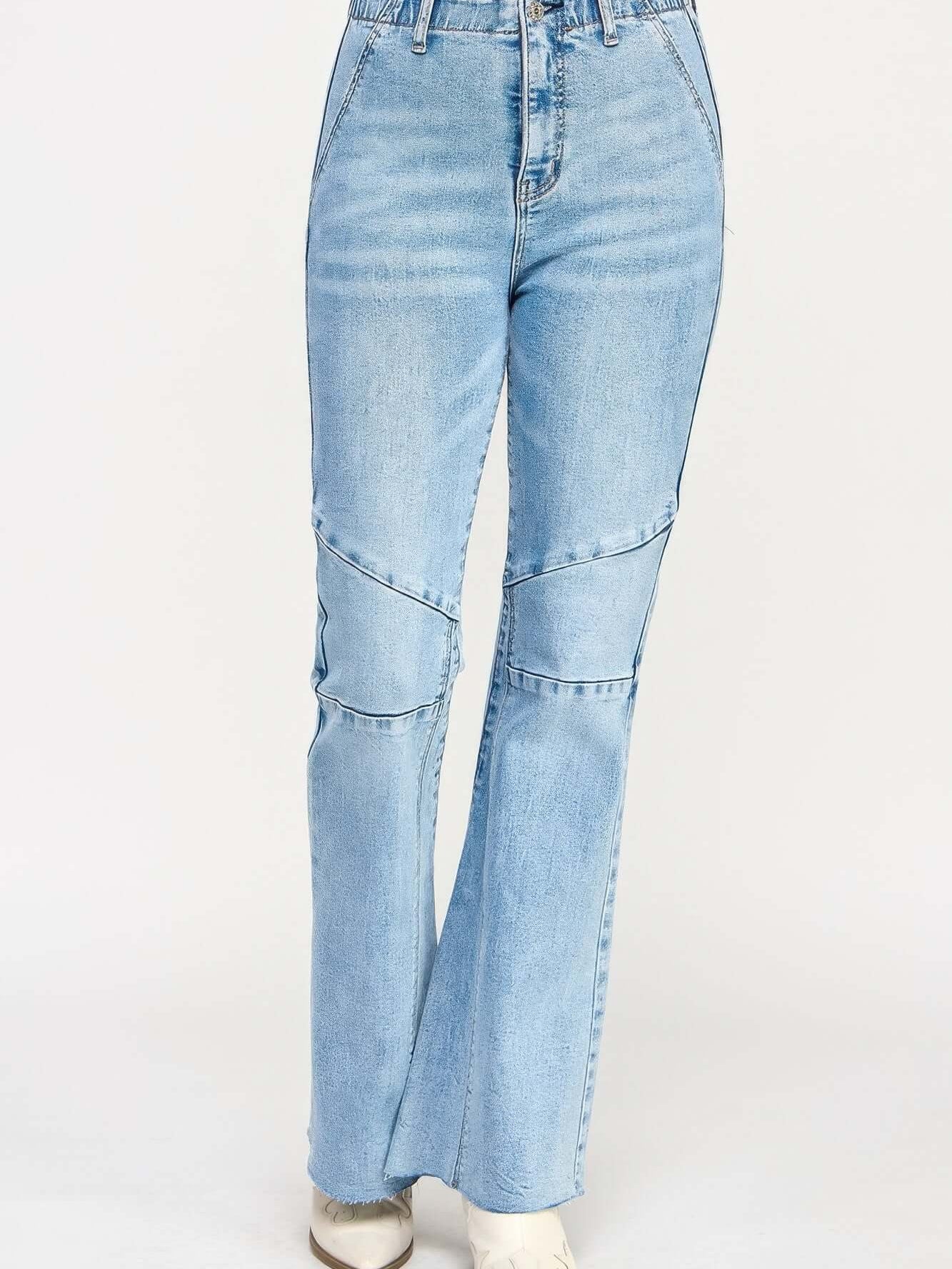 High Rise Flare With Seam Detail jeans featuring a high rise fit and stylish seam accents for a sleek silhouette.