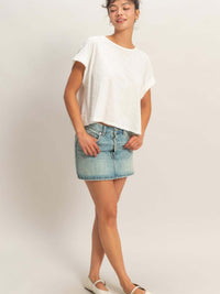 Acid Washed Cross Detail Open Back Top worn with a denim skirt, showcasing a stylish summer look.