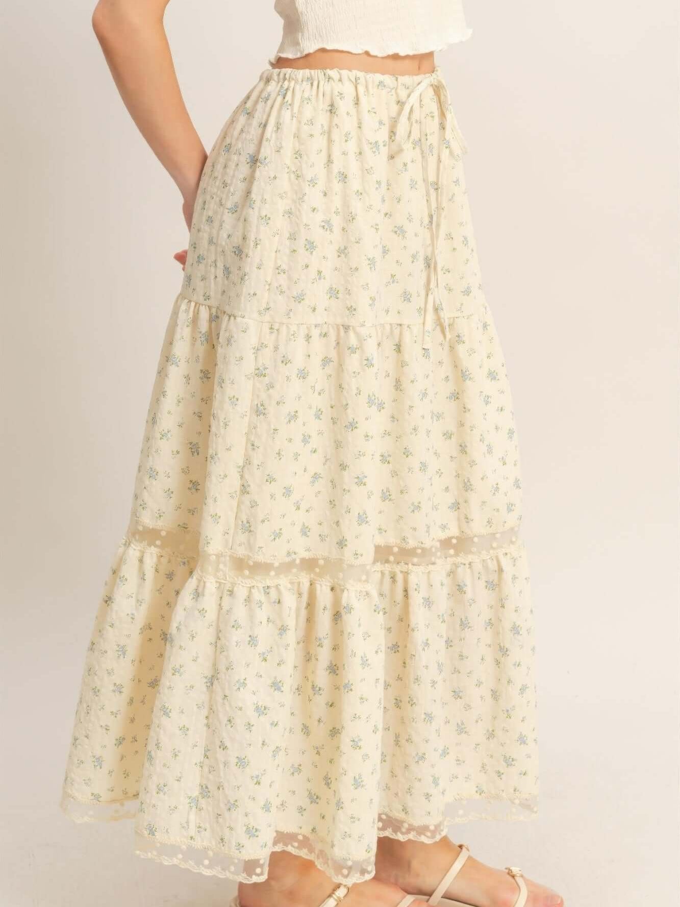 Tiered Lace Trim Skirt featuring a flowing silhouette and delicate lace detail for feminine charm.