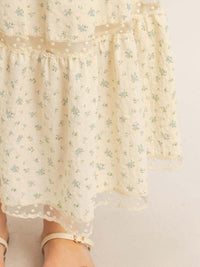 Tiered Lace Trim Skirt featuring a delicate floral design and lace trim details, capturing graceful movement and feminine charm.