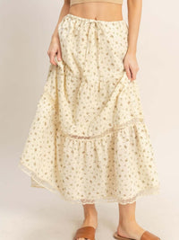 Tiered Lace Trim Skirt featuring delicate lace detailing and a flowing silhouette.