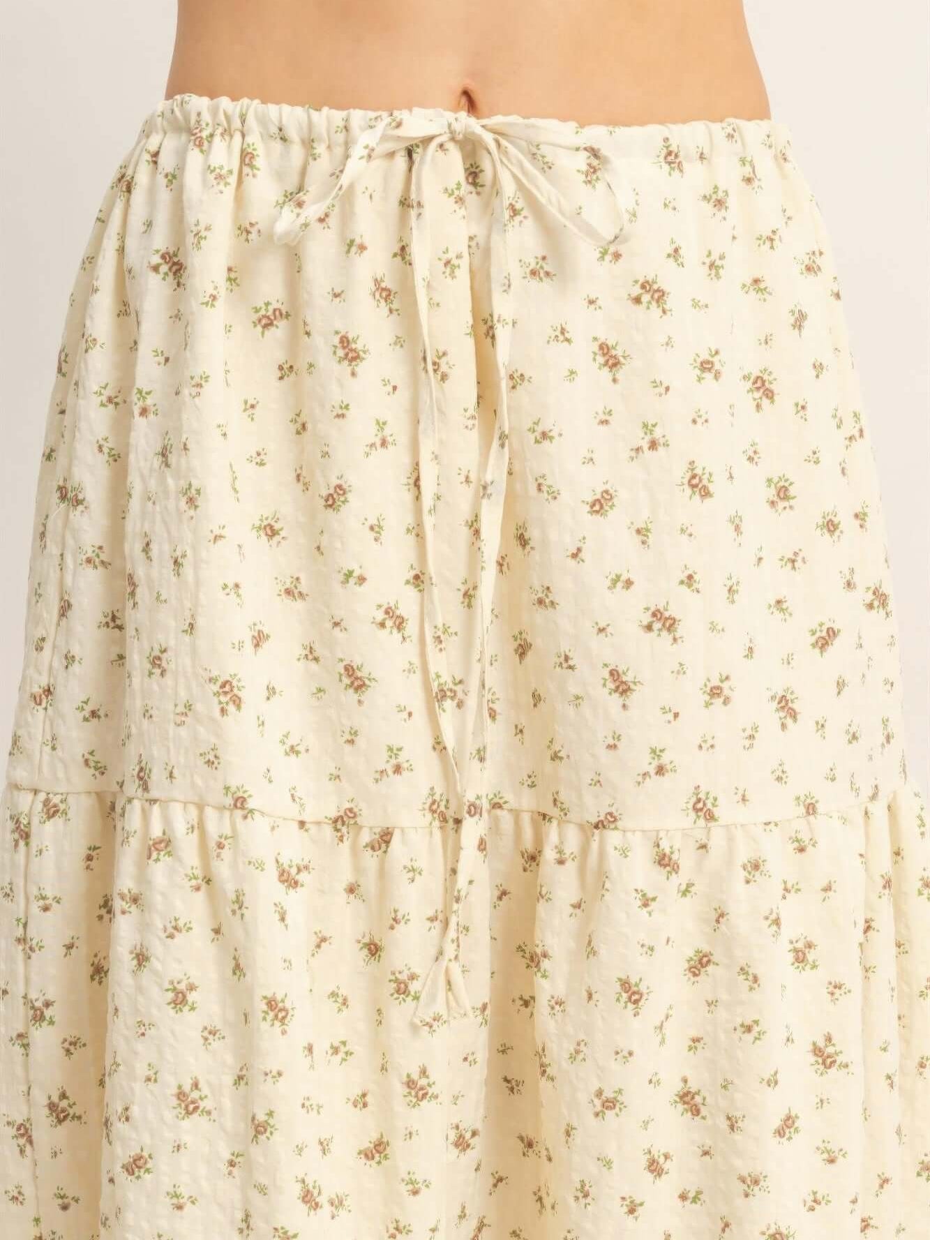 Tiered Lace Trim Skirt featuring a drawstring waistband and delicate floral print design for feminine charm.