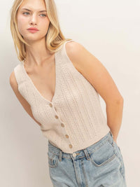 V-neck Knit Tank Top shown in beige with a button-front closure and textured ribbing, perfect for versatile styling.