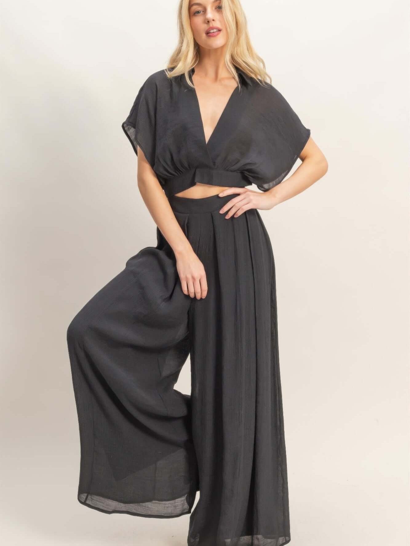 Collared Wrap Top & Wide-leg Pants Set showcasing a stylish model wearing a black cropped top and flowing wide-leg pants.