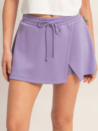 Wrap Front Elastic Waist Skort in lavender with adjustable waist and stylish wrap detail for active wear.