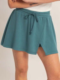 Wrap Front Elastic Waist Skort in teal color, showcasing an elastic waistband and wrap front detail, perfect for activewear.