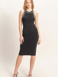 Model wearing a Ribbed Sleeveless Dress in black with a sleek, body-skimming silhouette.