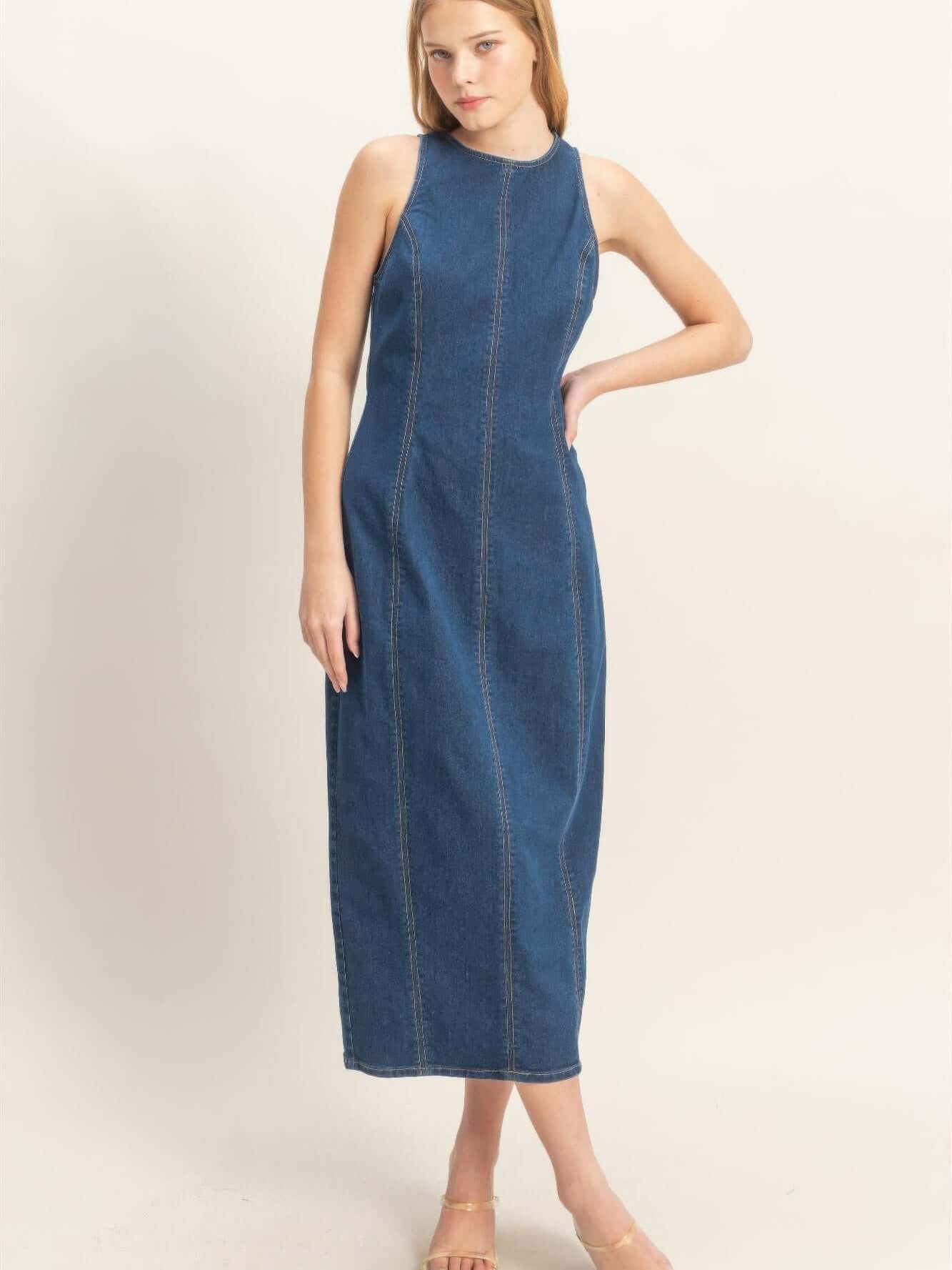 Sleeveless Denim Midi Dress on a model, featuring a modern design and comfortable fit.