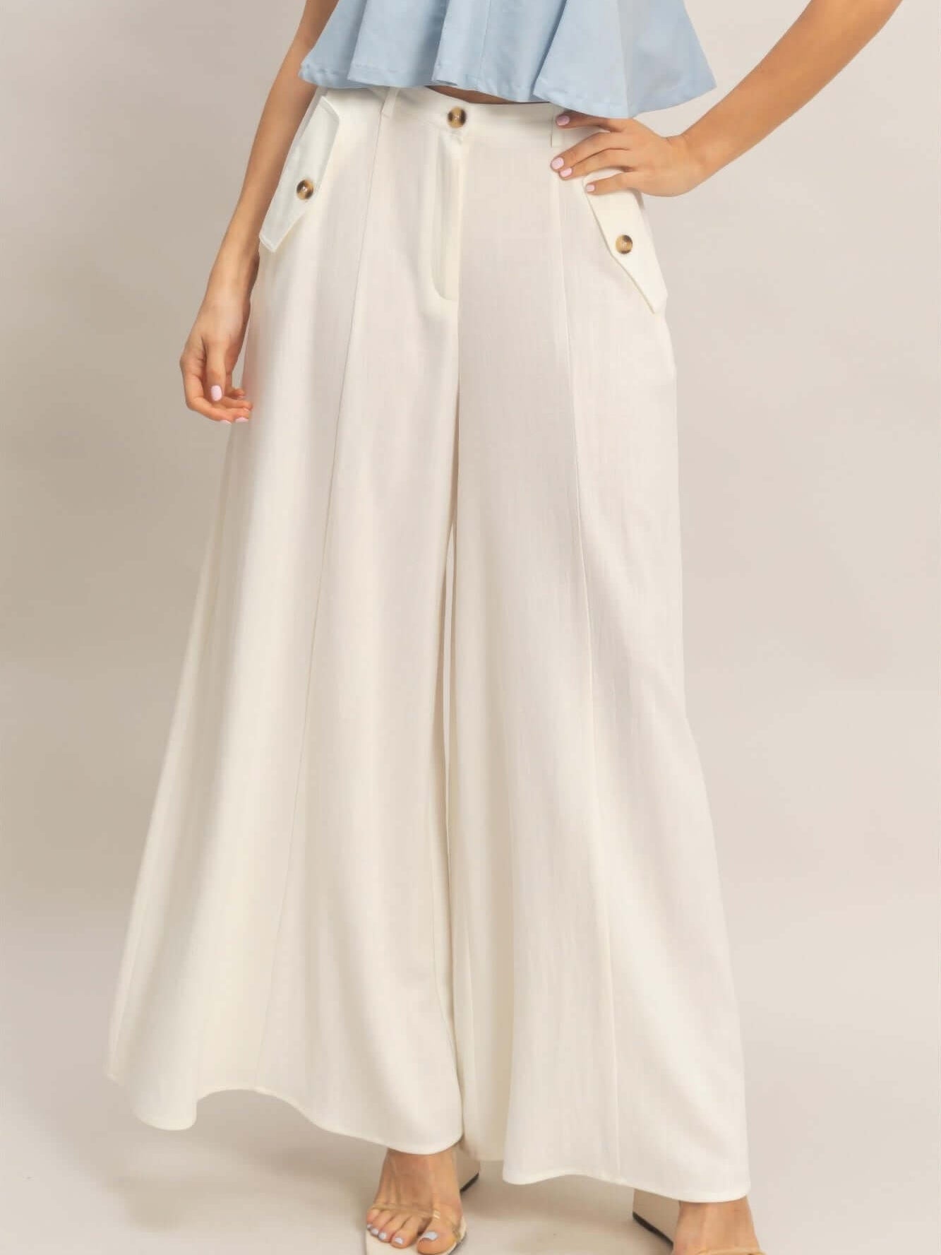 Wide-leg Flap Pocket Pants featuring a stylish structured silhouette and lightweight breathable fabric.