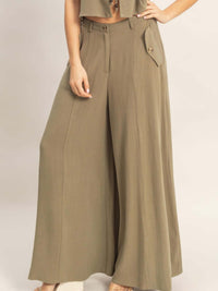 Wide-leg Flap Pocket Pants in olive green with flap pockets and a structured silhouette.