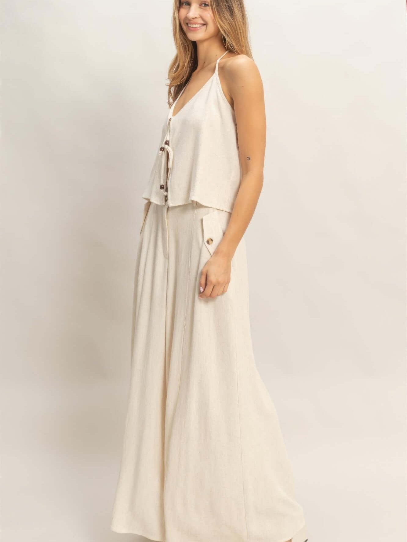 Wide-leg Flap Pocket Pants worn by a model, showcasing a stylish wide-leg silhouette and flap pockets.