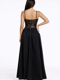 Back view of Netted Sequin Maxi Dress showcasing its elegant silhouette and intricate sequin bodice.