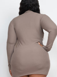 Back view of a plus size ribbed long sleeve mock neck mini bodycon dress in a neutral color, highlighting its flattering fit.